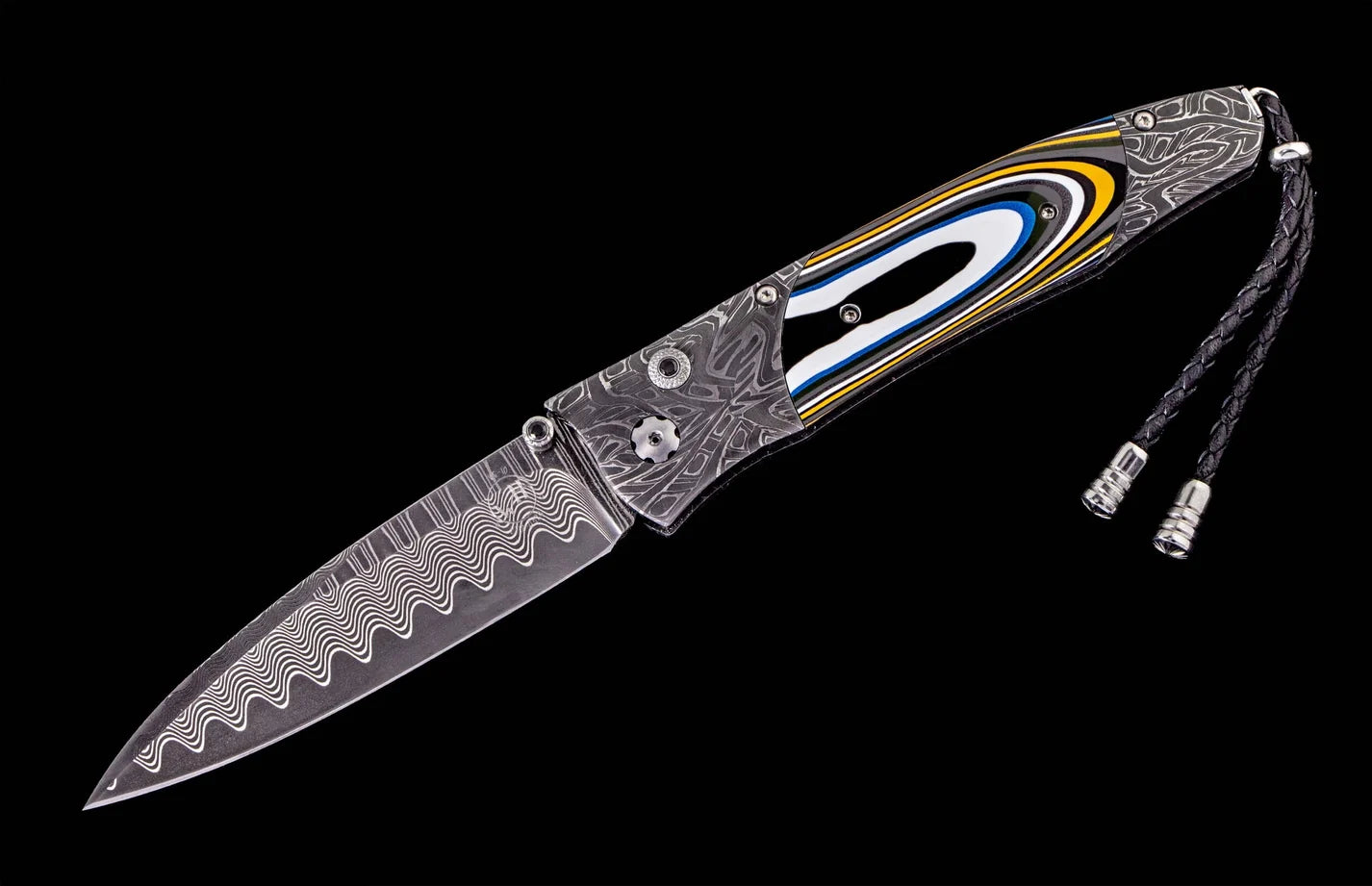Folding knife with decorative handle on a black background