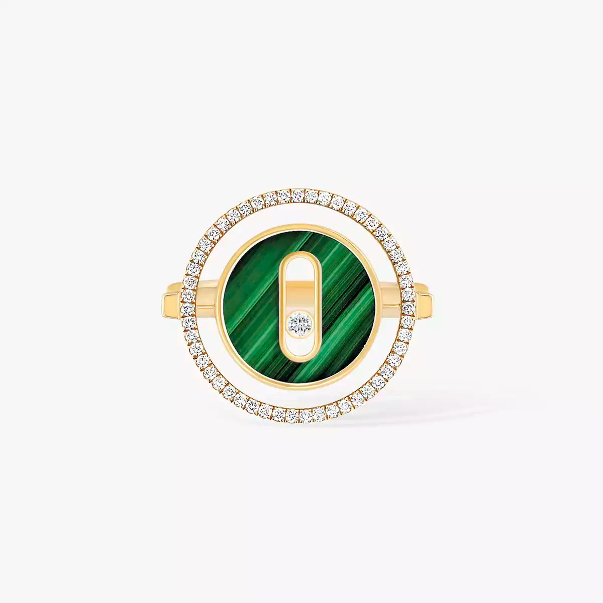 Jewelry with green stone and gold frame on white background