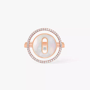 Rose gold ring with a central gemstone on a white background