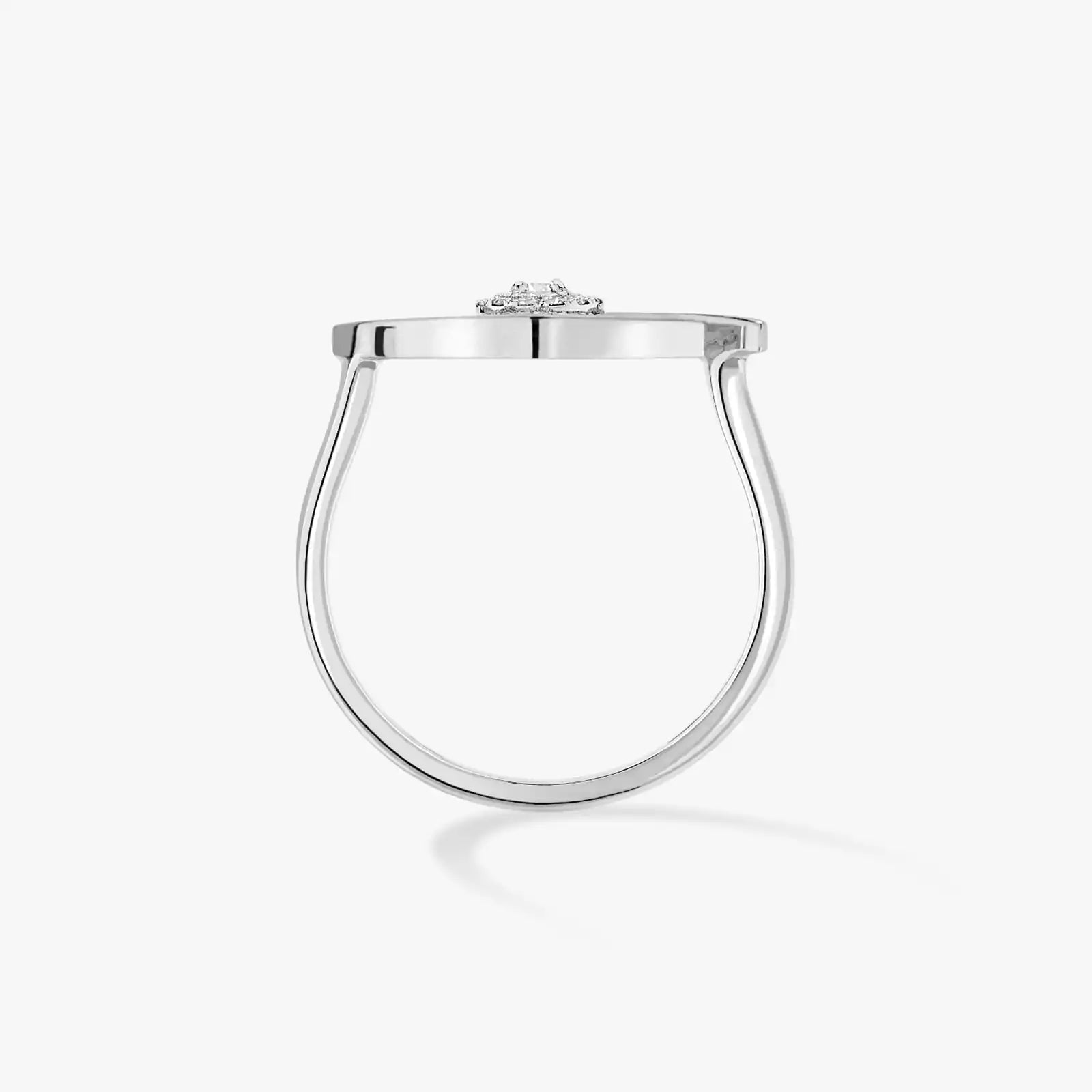 Silver ring with a small diamond on a white background