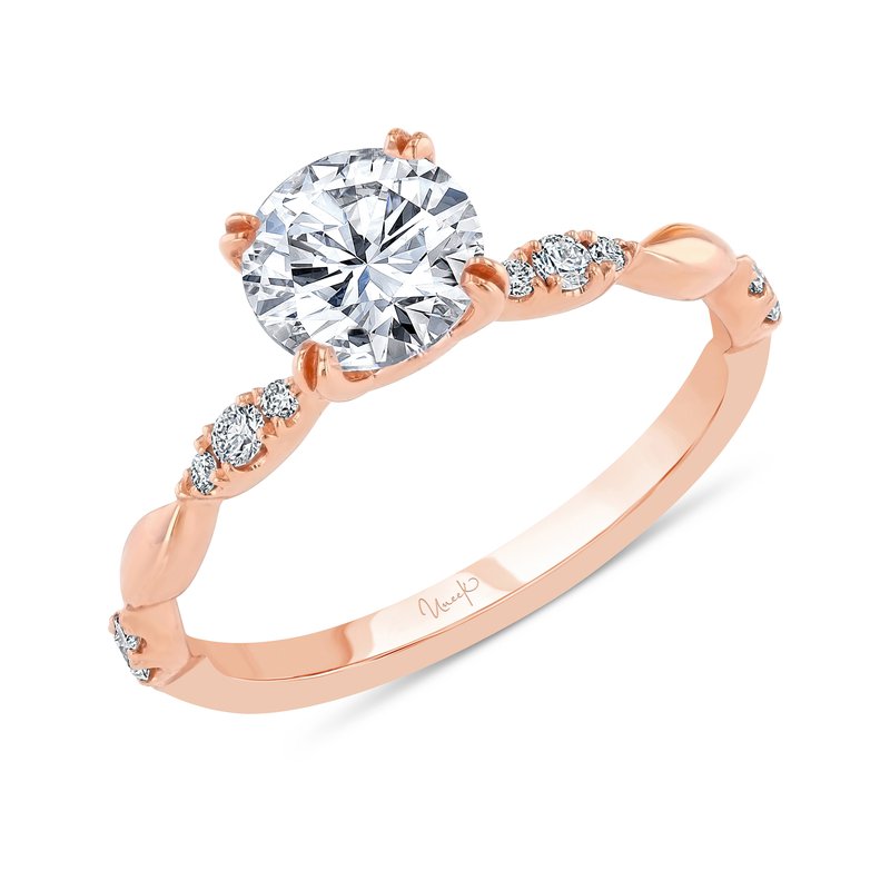 0.13ctw round engagement ring in rose gold with twisted band and small side diamonds