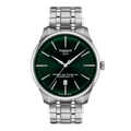 Front view of Tissot Chemin Des Tourelles 42mm watch showcasing green sunburst dial, date at 6 o'clock and stainless steel bracelet on white background