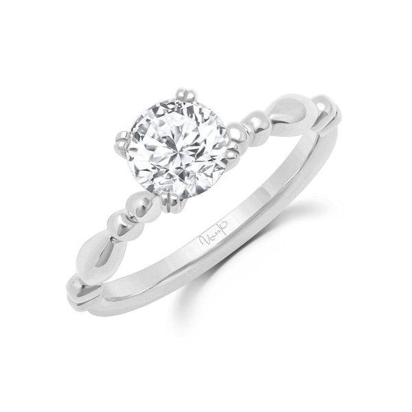 0.03ctw Diamond Solitaire Round Engagement Ring