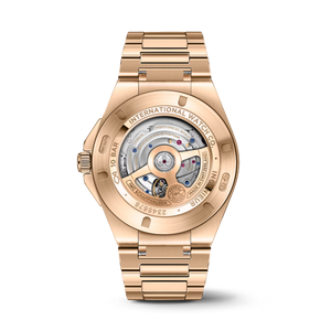 Rose-gold watch back with visible text: INTERNATIONAL WATCH CO; INGENIEUR; 10 BAR; IWC SCHAFFHAUSEN