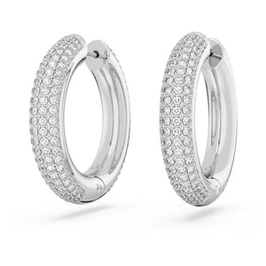 Front view of Dextera medium rhodium-plated hoop earrings showcasing pavé-set clear crystals on a white background