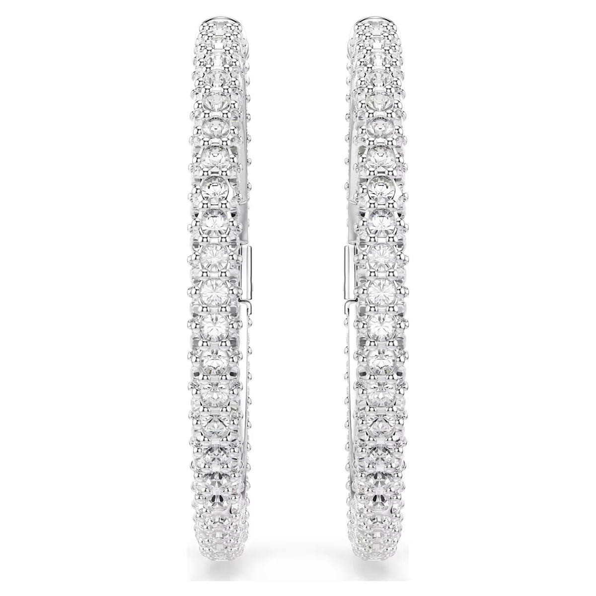 silver tone crystal hoops on a white background