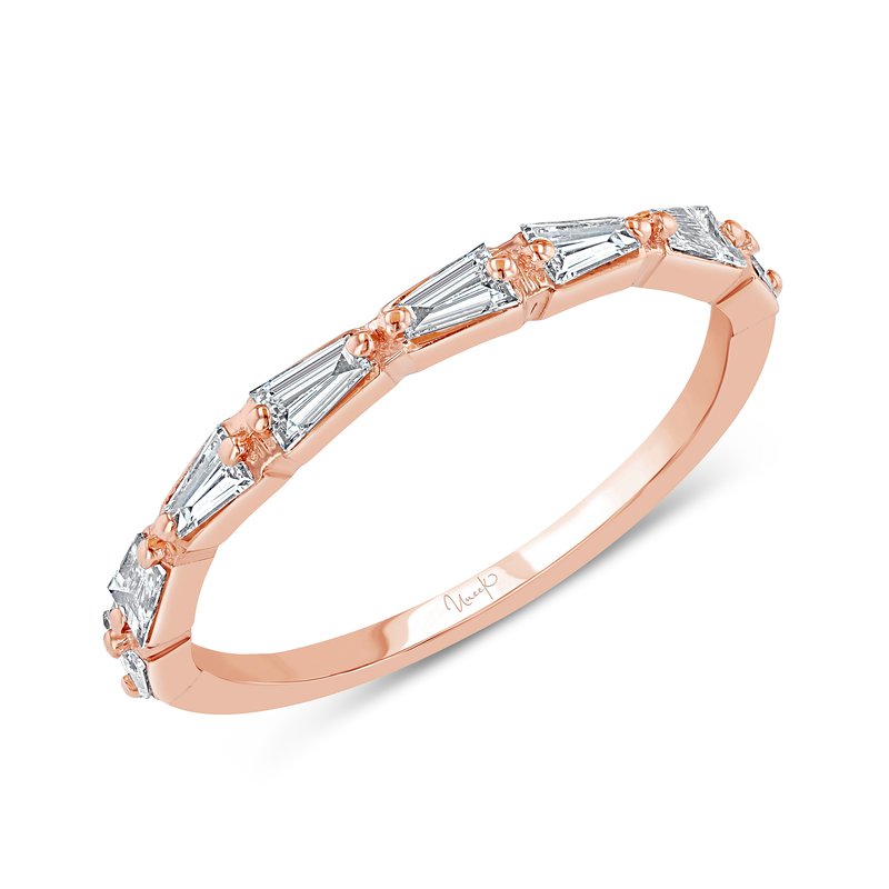 Rose-gold slim band set with tapered baguette diamonds spaced along the top.