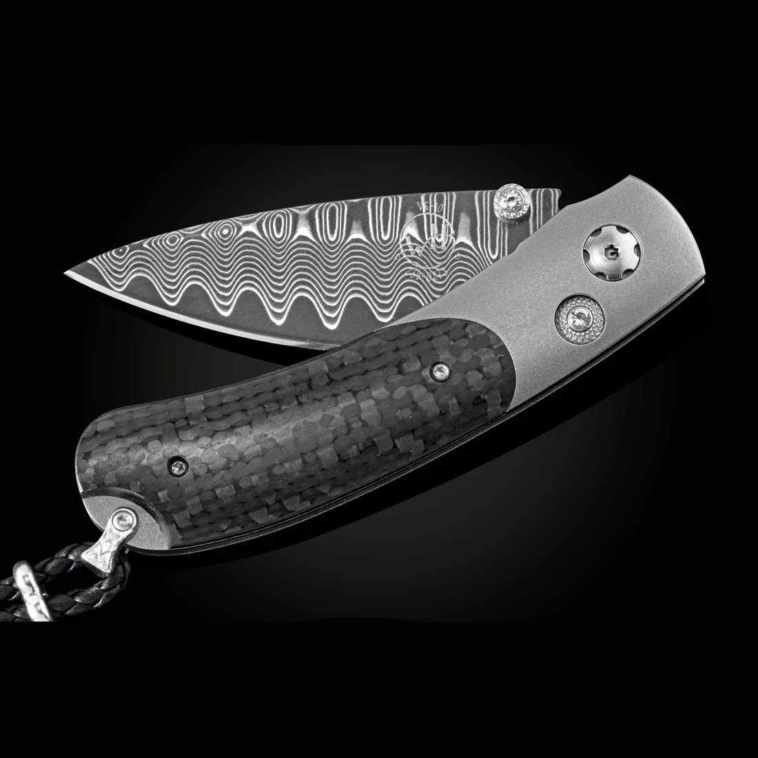 Folding pocket knife with patterned Damascus blade, carbon-fiber handle and braided lanyard