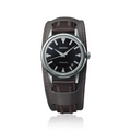 Front of Seiko SJE085 1959 Alpinist limited watch showcasing black dial, steel case and brown leather cuff strap on white