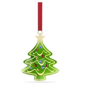 Green crystal tree ornament with red ribbon on a white background