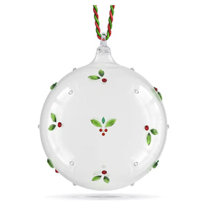 mistletoe ball ornament with red and green thread on a white background