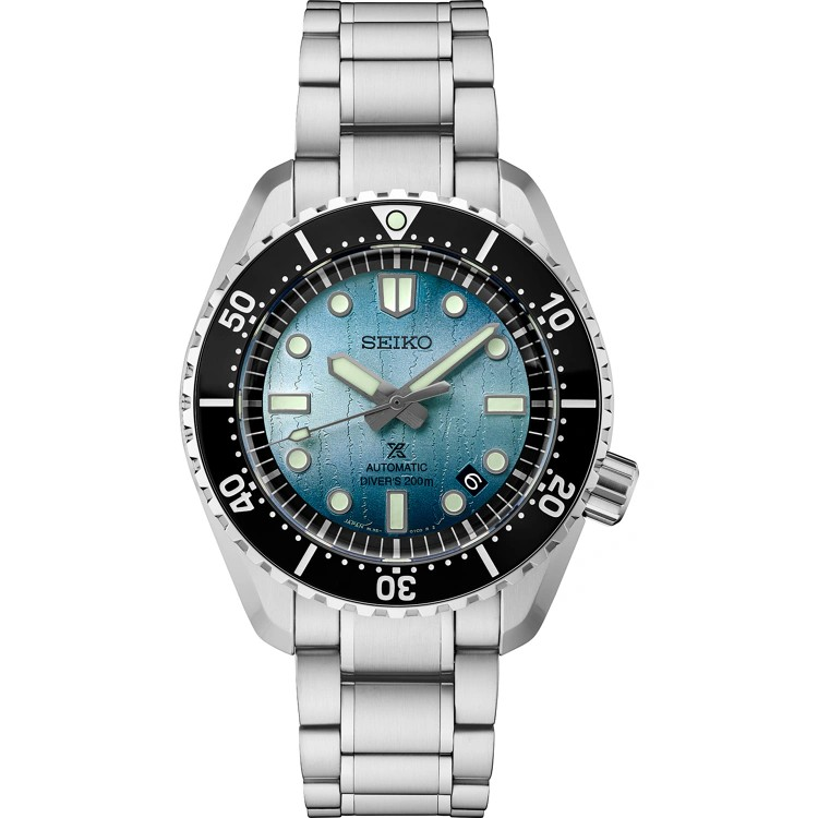 Seiko watch with silver bracelet and blue face on a white background