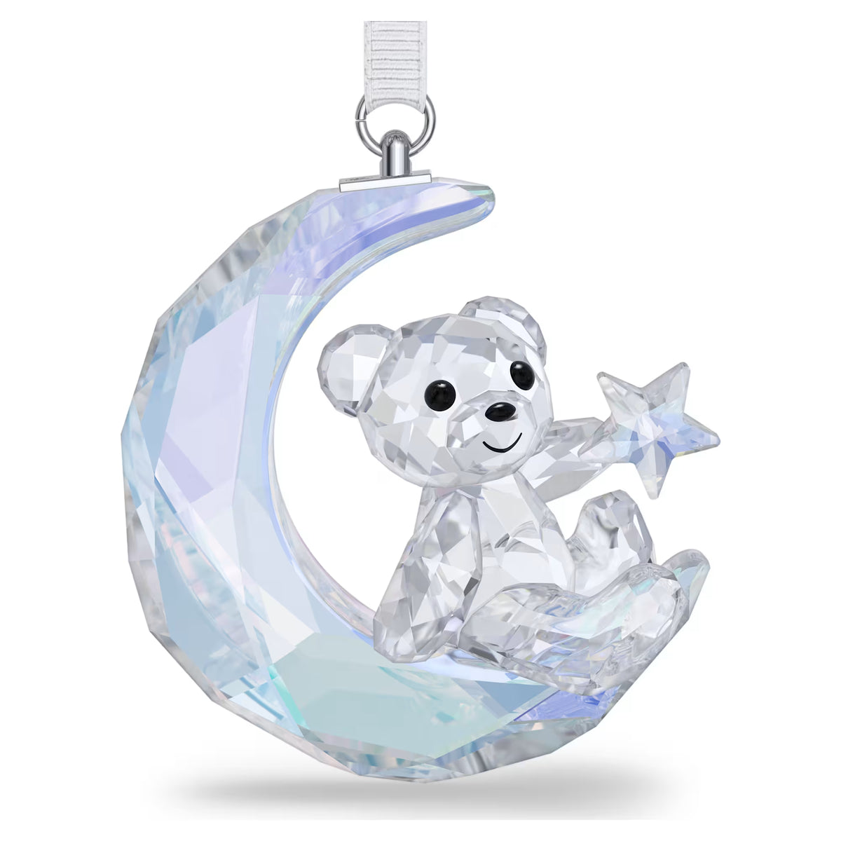 kris bear crystal figurine sitting on the moon with a star in its hand on a white background