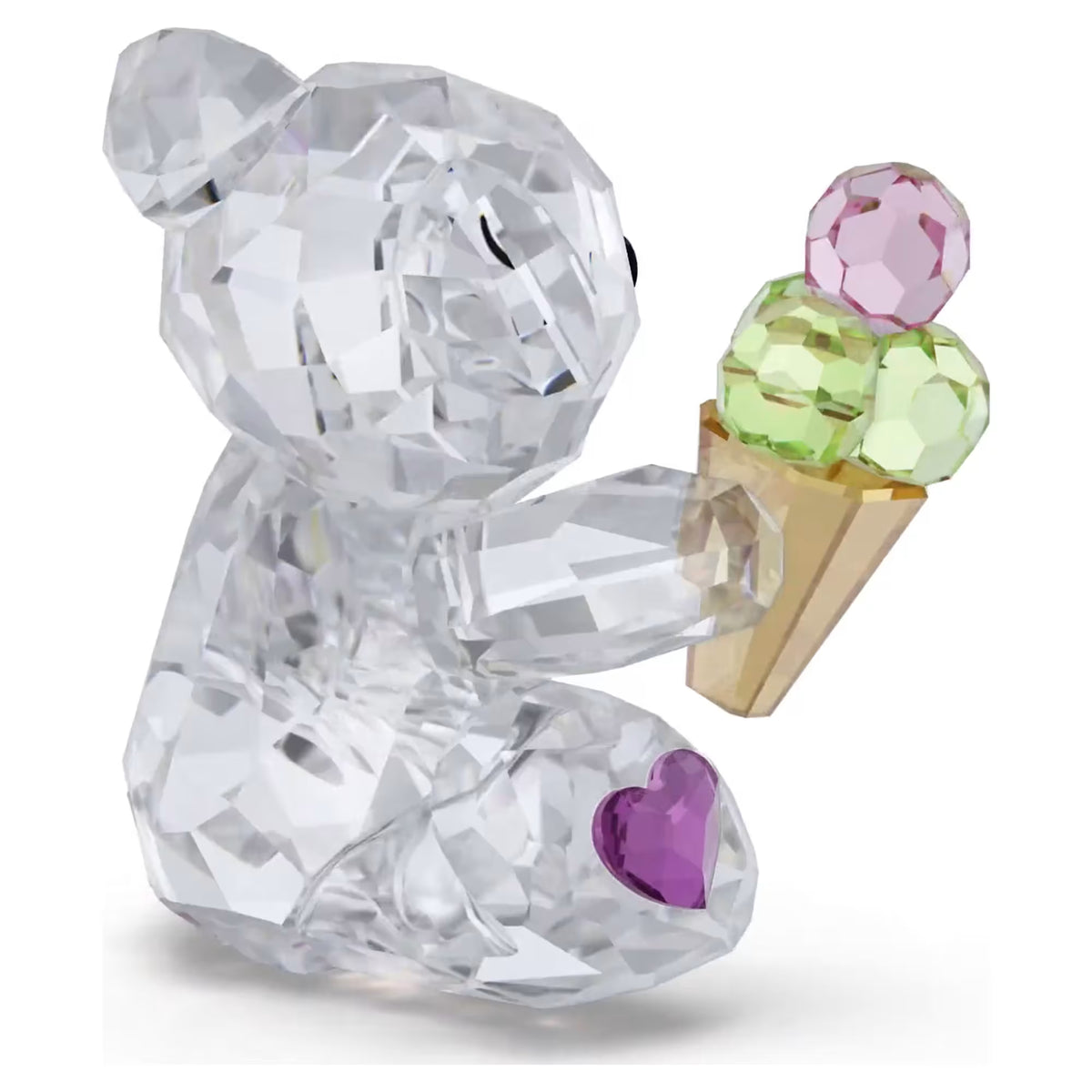 side view of multicolored bear holding an ice cream cone on a white background