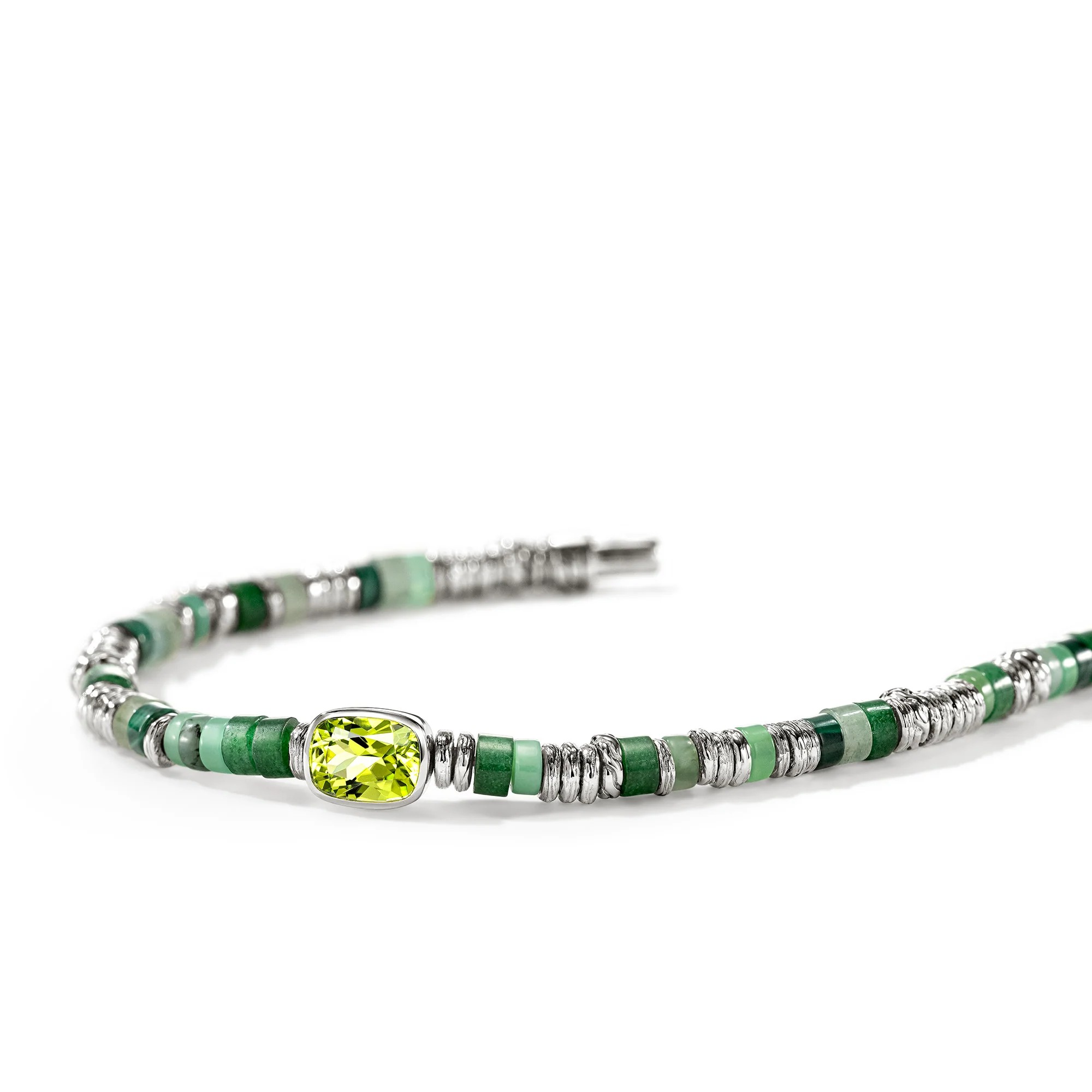 A beaded bracelet featuring green stone beads, textured silver spacer beads, and a central cushion-cut yellow gemstone in a silver bezel setting, displayed on a clean white background.