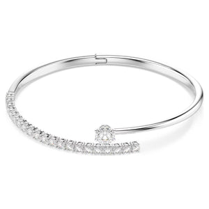 Silver tone open bangle bracelet with zirconia stones on white background