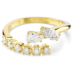 Gold tone ring with cubic zirconia mixed stones on white background
