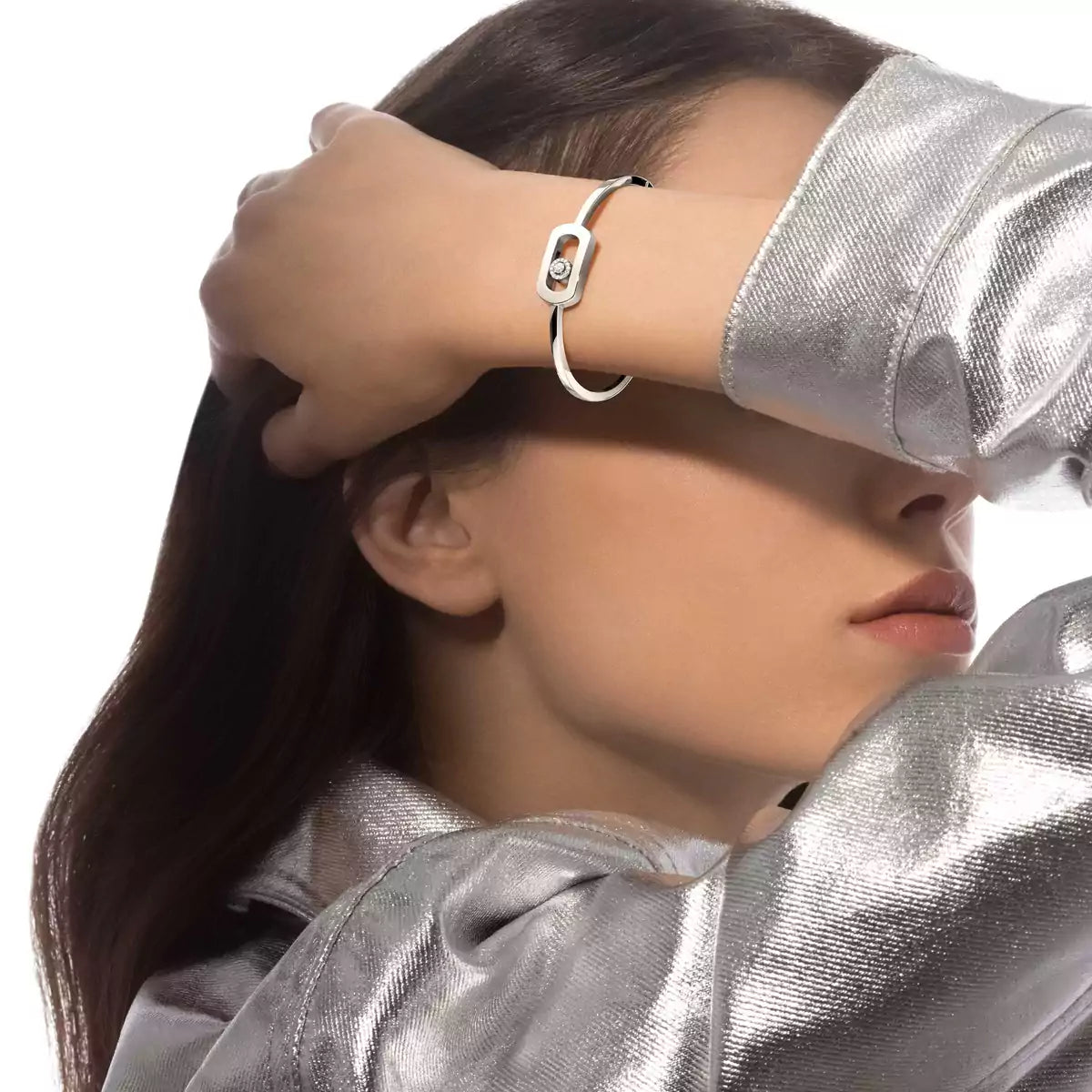 model wearing 0.11ctw White Gold Diamond Bangle Bracelet