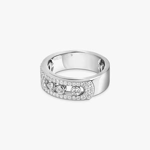 Silver ring with embedded stones on a white background