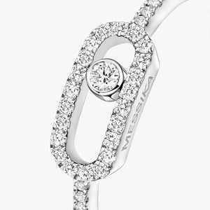 Silver ring with diamonds on a white background