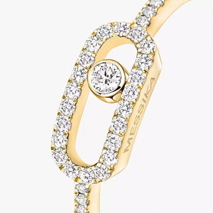 Gold ring with diamonds on a white background