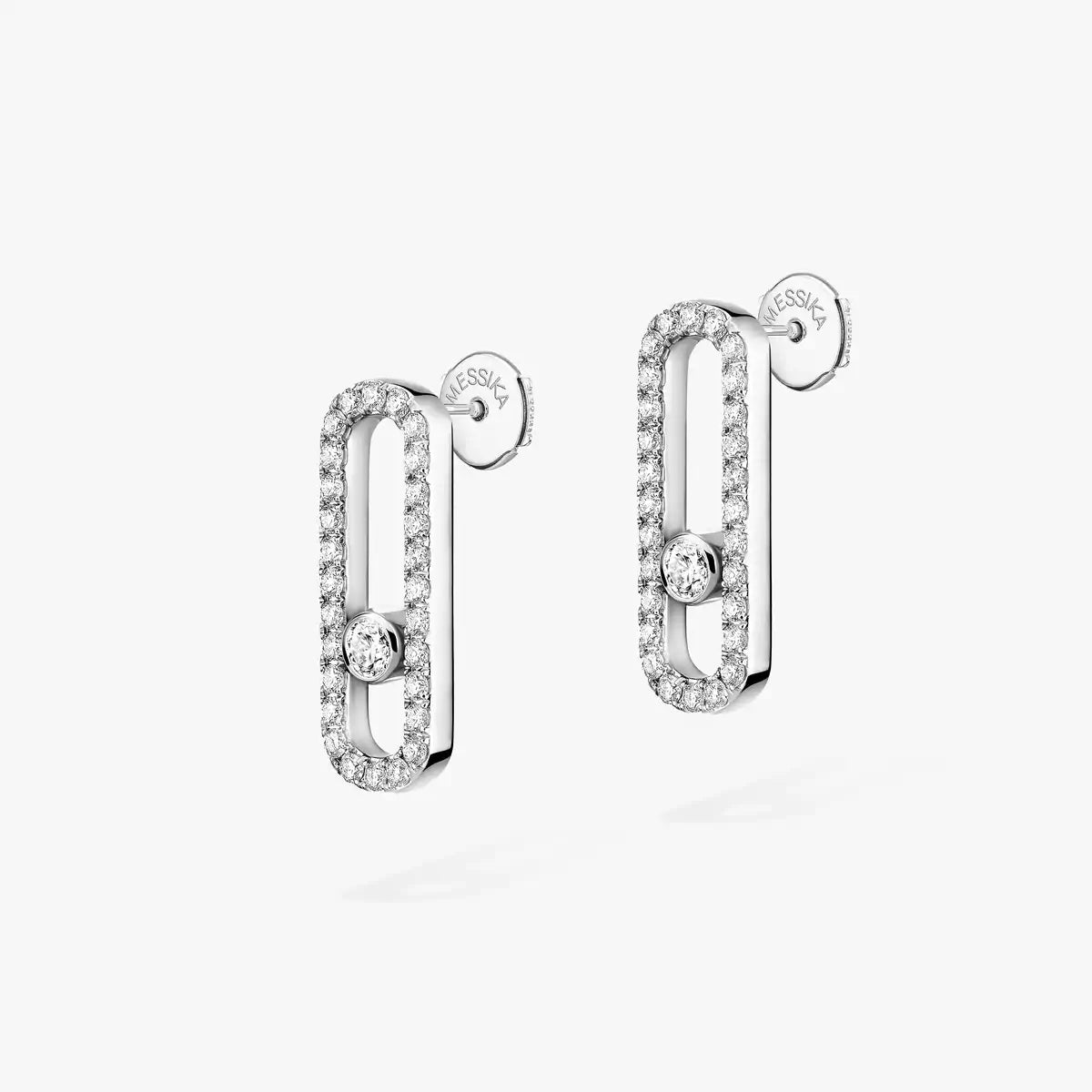 Pair of silver hoop earrings with diamonds on a white background