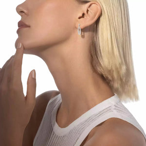 model wearing 0.41ctw White Gold Diamond Stud Earrings