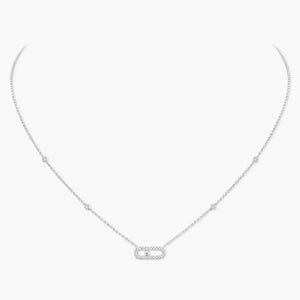 Silver necklace with a small pendant on a white background