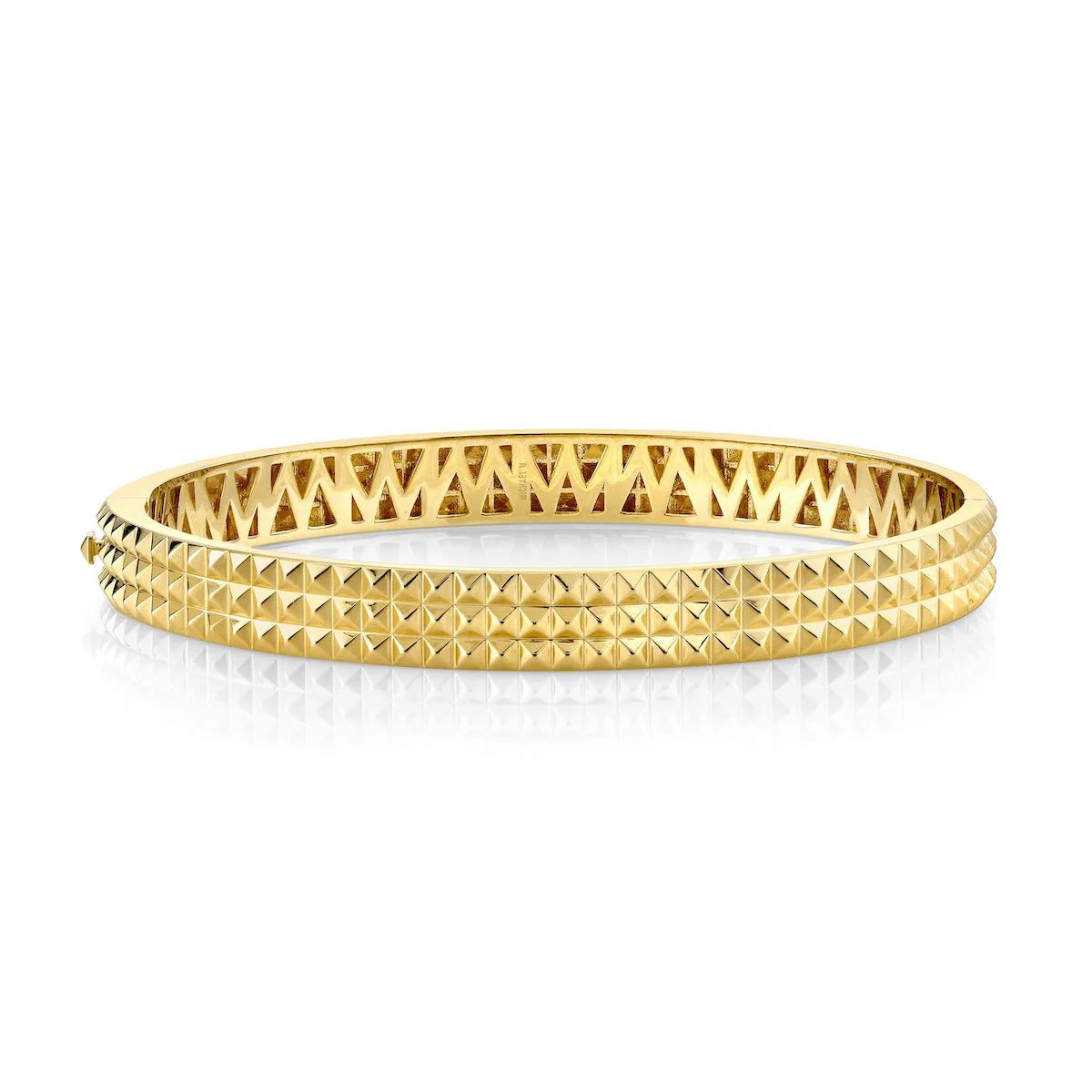 Front view of Men's Tetra 14K yellow gold bracelet with three rows of pyramid studs on white background