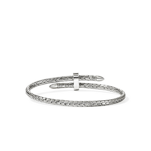 Angled view of sterling silver spear flex cuff with pave diamond accents on braided 4mm band, spear tips, white background