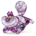 Purple faceted crystal Cheshire Cat figurine with large toothy grin and yellow eyes