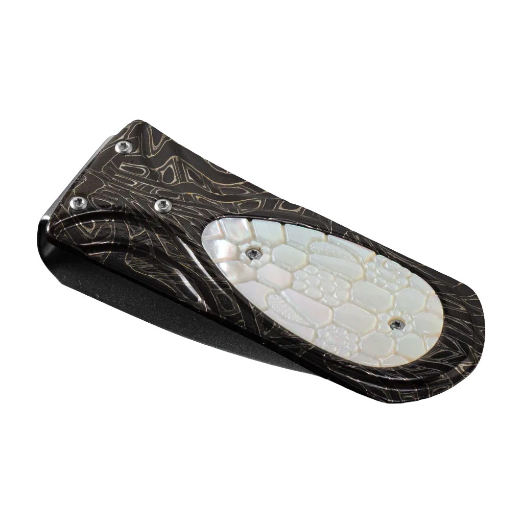 Angled view of William Henry Zurich Viper money clip with Brain Wave damascus and mother of pearl inlay on white background