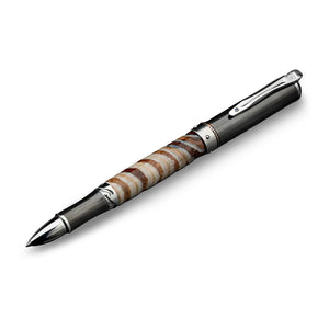 Angled view of William Henry Cabernet Mammoth pen with Woolly Mammoth tooth barrel and titanium trim on white