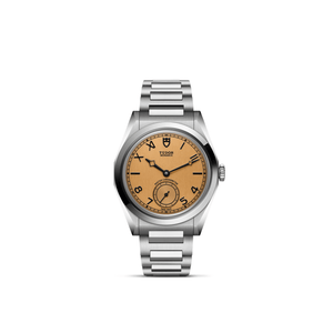 Front view of TUDOR Monarch 39mm watch with stainless steel bracelet and champagne dial with small seconds on white background