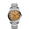 Front view of TUDOR Monarch 39mm watch showcasing dark champagne dial and stainless steel bracelet on white background