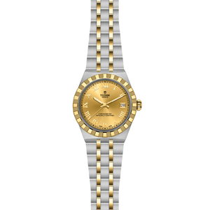 Two-tone watch with gold and silver band on a white background