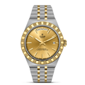 Tudor watch with gold and silver band on a white background