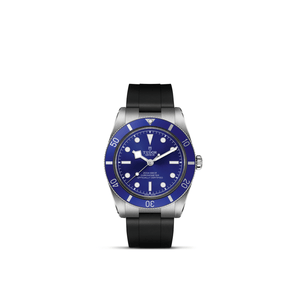Front view of TUDOR Black Bay 54 watch with blue domed dial, stainless steel case, and black rubber strap on white background