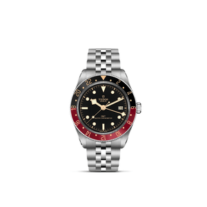 Tudor watch with black face, red bezel, and silver bracelet on a white background