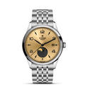 Front view of TUDOR 1926 Luna 39mm steel watch showing champagne sun-brushed dial with moon phase and date on white background