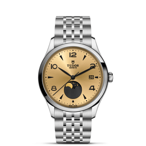 Front view of TUDOR 1926 Luna 39mm steel watch showing champagne sun-brushed dial with moon phase and date on white background