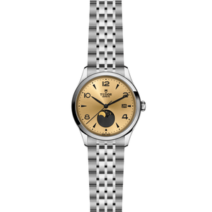 Front view of TUDOR 1926 Luna watch showcasing champagne dial with moon phase indicator and steel bracelet on white background