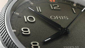 Oris watch face with black dial and silver bezel