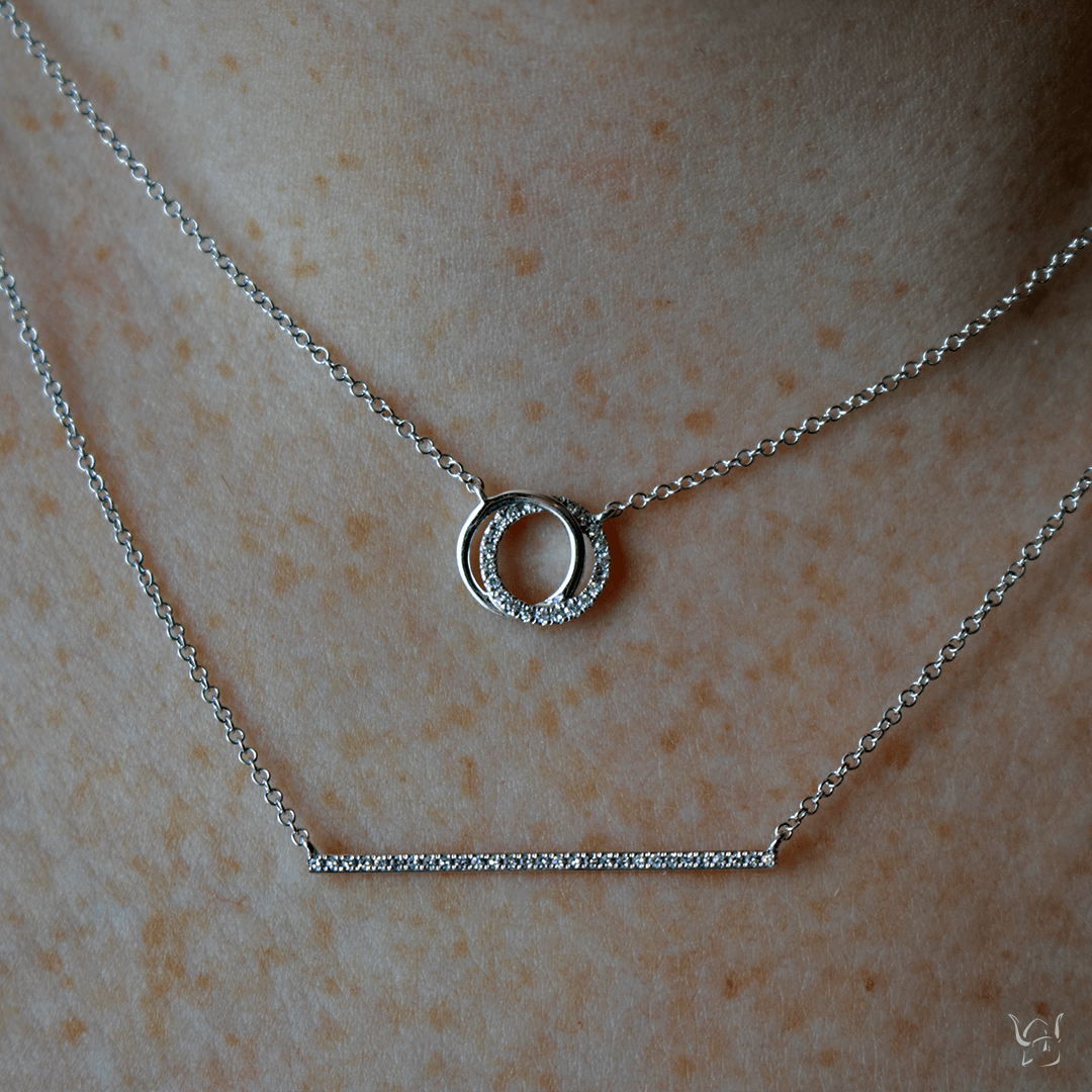 0.07ctw Diamond Love Knot Necklace - Gunderson's Jewelers