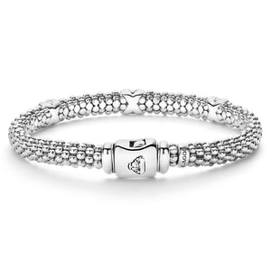 Front view of 6mm Three Station X Caviar bracelet with caviar beading and three sterling silver X stations on white background