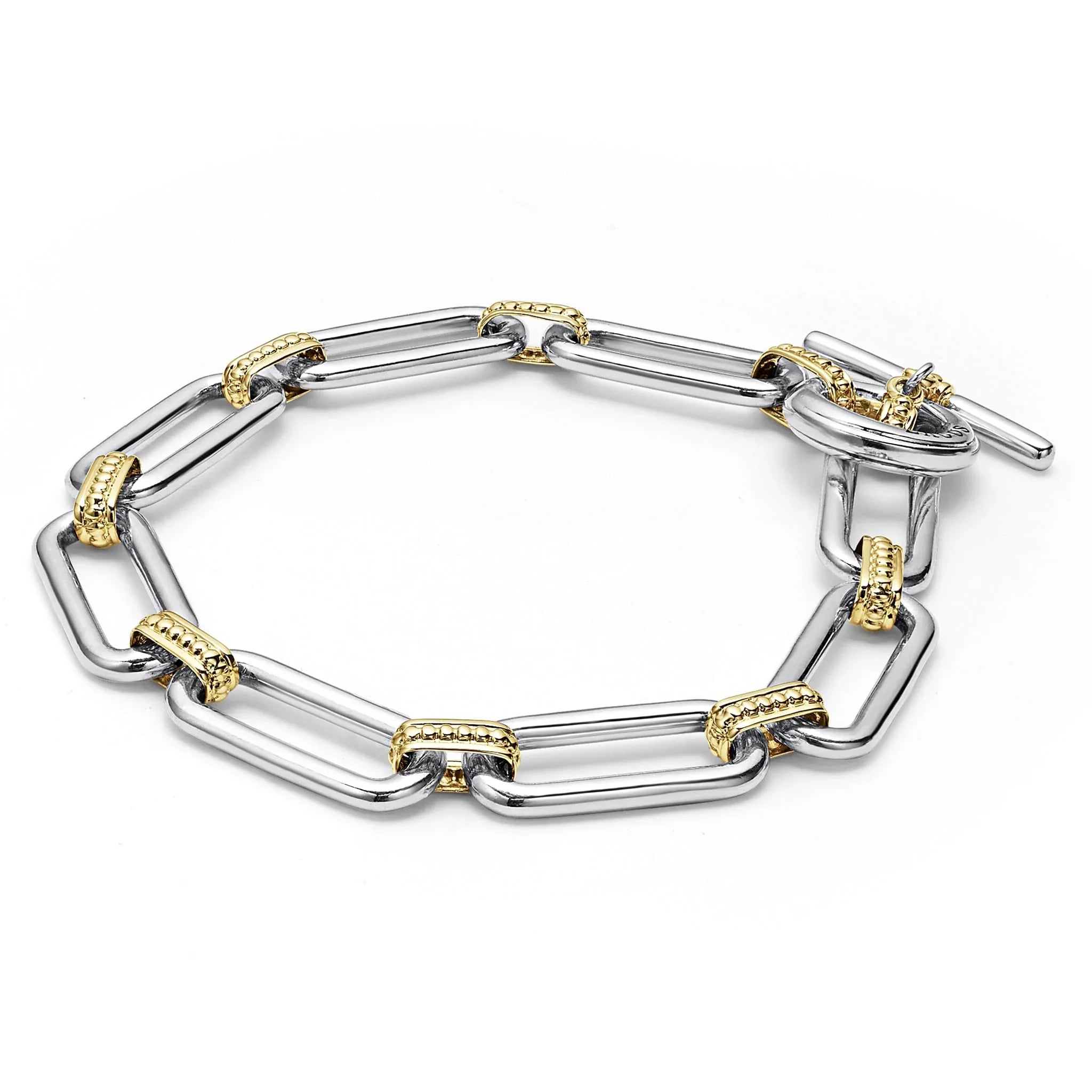 Top down view of Two-Tone Link Bracelet showing polished sterling silver elongated links with 18k yellow gold caviar beaded accents on white background