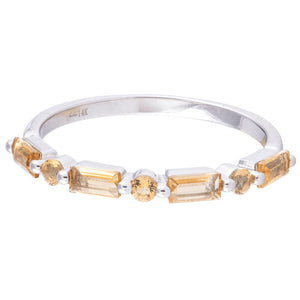 Silver band engraved '14K' set with alternating rectangular (baguette) and round yellow gemstones.