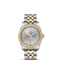 Front view of TUDOR Black Bay S and G 31mm watch with two-tone steel and yellow gold bracelet and diamond-set bezel
