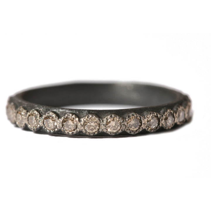 Sterling silver black rhodium stack band ring with 1.7mm champagne diamonds.