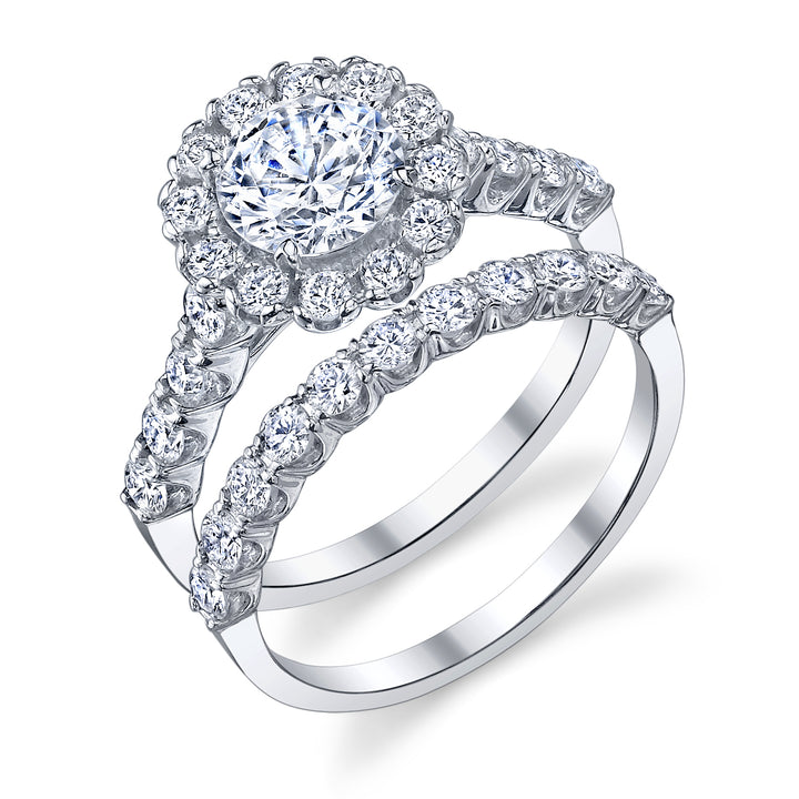 Classique Creations 14K white gold .58ctw diamond halo engagement ring